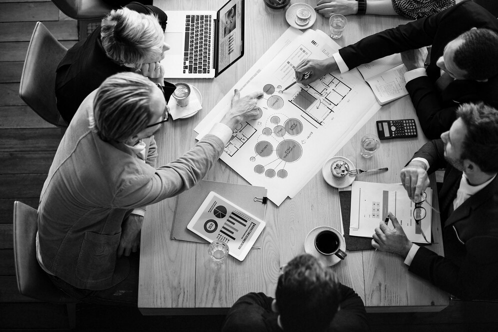 Team brainstorming digital strategy solutions